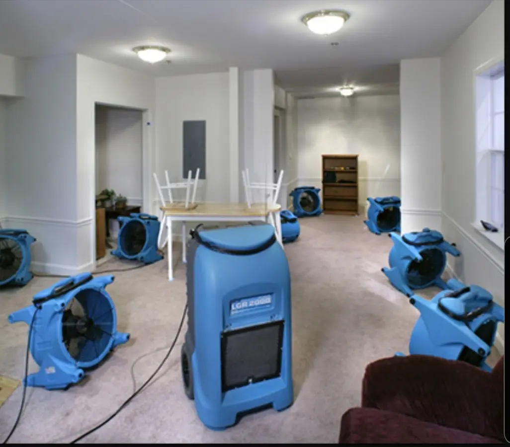 Air movers and dehumidifier setup for Water Damage Restoration in Trumbull
